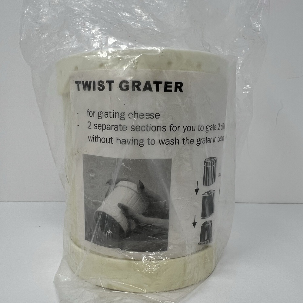 Hand Held Twist Cheese Grater With Dual Compartments
